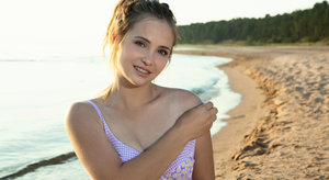 Amateur model Mackenzie bares her perfect ass for a nude beach romp